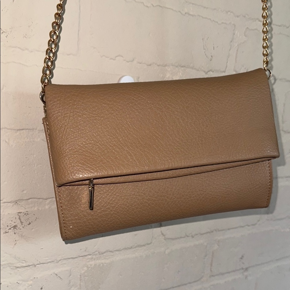 INC Elegant crossbody Tan faux Leather Bag
Fold over adjustable straps